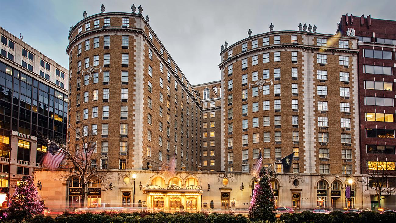 Exterior of Marriott Vacation Club timeshare at The Mayflower Washington, DC with landscaped boulevard in foreground